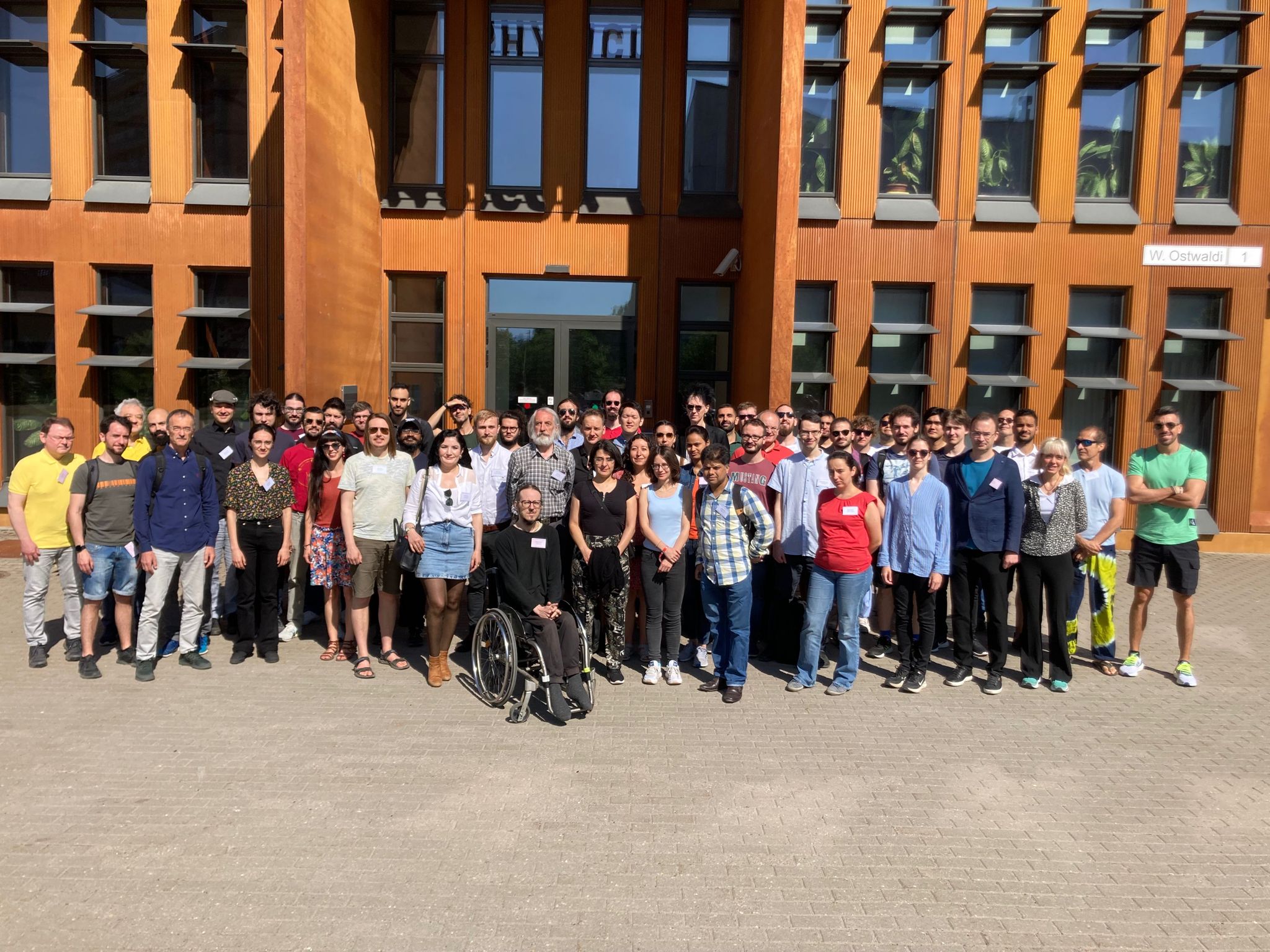 Group photo in front of the Institute of Physics at the University of Tartu.